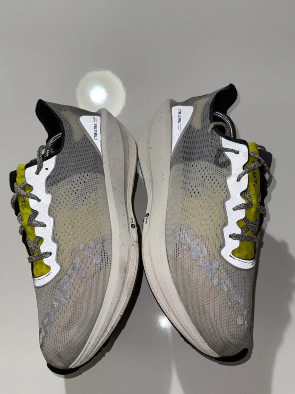 Craft Lightweight Neutral Gray Running Shoes with Bright Yellow Accents